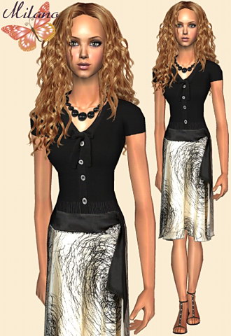 Fancy short sleeves sweater with printed knee length skirt and high heeled sandals.