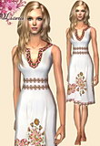 white ethnic dress with embroidered flowers