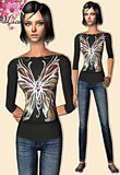Butterfly graphic top and printed sneakers with a pair of dark wash jeans.